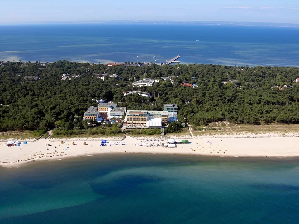 Jurata from above – beach, a building by the shore and forest